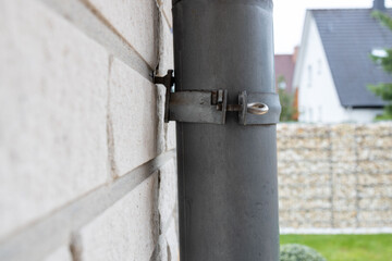 Rainwater pipe connection on the wall