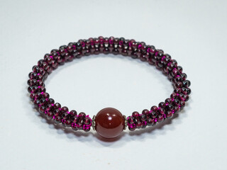 Gemstone bracelet on white background