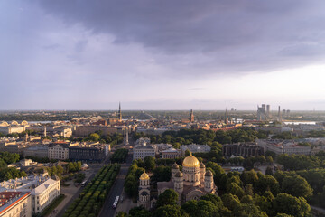 Obraz premium Skyline of the city of Riga seen from the terrace of a hotel, at sunset.
