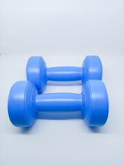 Blue colour 1kg Gym Dumble for fitness on white background.