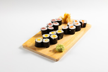 Assorted japanese sushi food. sushi with tuna, crab, salmon, eel and rolls. Japanese food isolated on white background