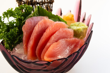Fresh Tuna sashimi. Japanese food on restaurant table. Isolated on white background. Food traditional Japanese style