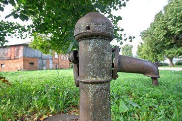 Water tap in the village in summer