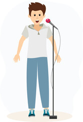 Musical concert.Boy with a microphone sings in a karaoke club or recording studio.
