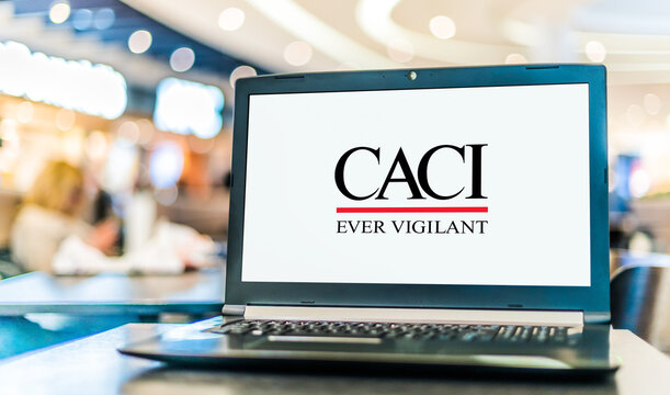 Laptop computer displaying logo of CACI International