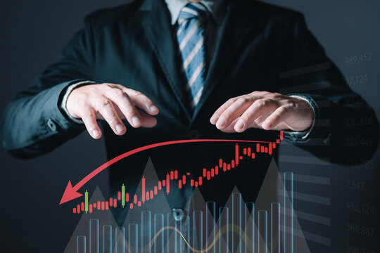 Business failure in the hands of businessmen. the graph downtrend, bear stock market, economic crisis, or recession.