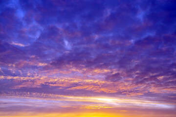 Naklejka na ściany i meble Beautiful sky with clouds at sunrise, natural background