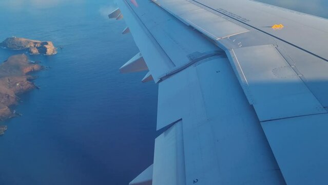 Beautiful view from the window of the plane to the islands in the Atlantic Ocean