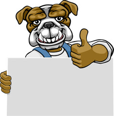 A bulldog painter, handyman, mechanic, plumber or other construction cartoon mascot man in overall dungarees. Giving a thumbs up.