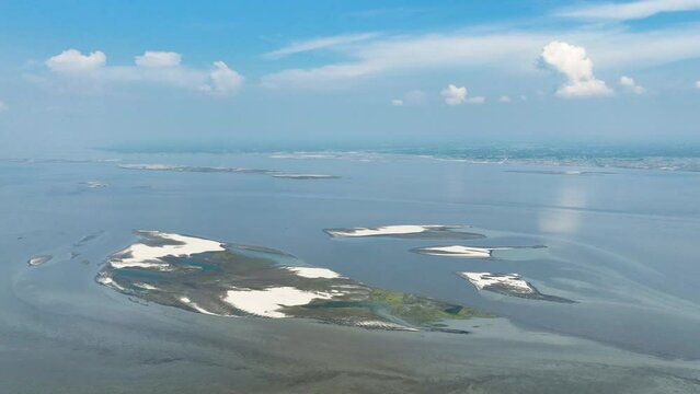 The aerial view of the Jamuna River. The sandbar villages are a unique feature of the Jamuna River. These villages are constantly shifting as the river erodes and deposits sand. 