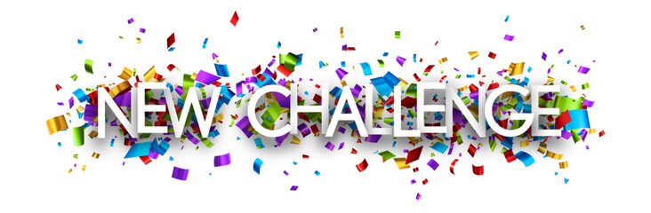 New challenge sign on colorful cut ribbon confetti background.