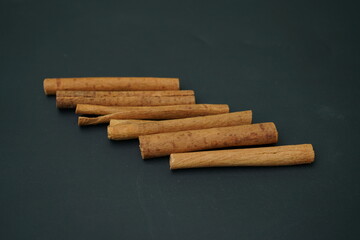Stacked Cinnamon rolls isolated on  black background , top view