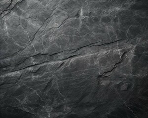 Black or dark gray rough grainy stone texture background