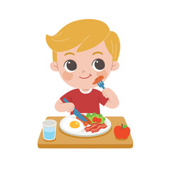 A Little boy happy to eat breakfast in the morning. Concept of Health and growing children.