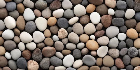 Tuinposter harmonic image of round gently colored pebble stones. © CreativeCreations