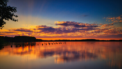 See im Abendrot - Sunset - Landscape - - Beautiful scene over the lake and silhouette hills in the...