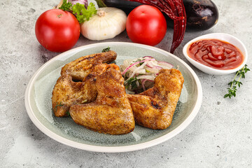 Grilled chicken wings with sauce