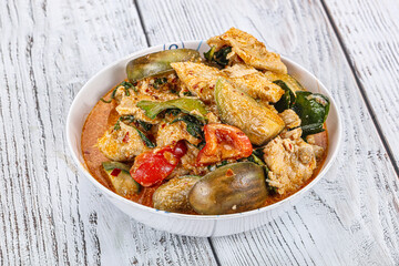 Thai red spicy curry with chicken