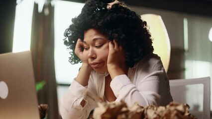 Portrait of exhausted young woman with failed ideas while take a break at home Tired female with creative block or lack of inspiration indoors	