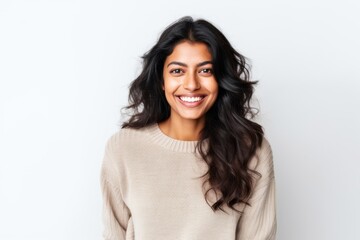 Group portrait of an Indian woman in her 30s against a white background