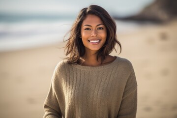 Group portrait of an Indian woman in her 30s in a beach 