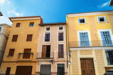 Fototapeta na wymiar Colorful houses in Xativa old town, Valencia (Spain).