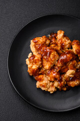 Delicious juicy grilled chicken meat bites with salt, spices and herbs