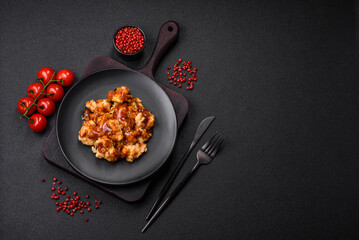 Delicious juicy grilled chicken meat bites with salt, spices and herbs