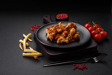 Delicious juicy grilled chicken meat bites with salt, spices and herbs