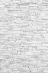 Empty black and white (light gray)  grain stone brick wall made with blocks for abstract  background and texture. beautiful patterns, space for work, banner, wallpaper close up, vertical.