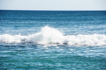 Scenic view of sea waves on a sunny day