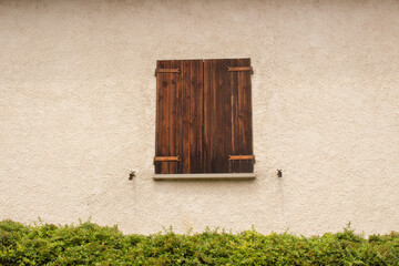 antique window with wooden doors 