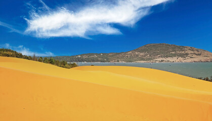 Beautiful coastal vietnamese landscape with sand dunes at ocean lagoon - Mui Ne, Vietnam