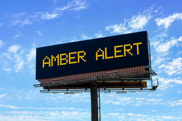 Electronic freeway Sign advising of an amber alert for child abduction - obrazy, fototapety, plakaty