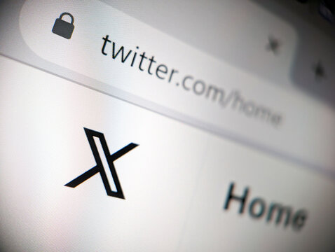 Twitter is updated with new X logo after Elon Musk's rebranding in 2023, closeup website displayed on a computer screen