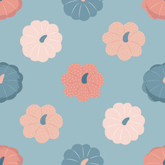 Seamless pattern, cute pumpkins on a blue background. Vector illustration in flat modern style.