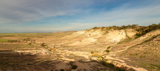 Mesas or Jump Ups in a wide valley and plain in arid Sturt National Park in New South Wales in Australia