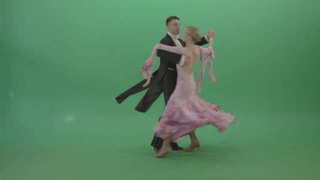 Luxury ballroom dancers performing slow waltz on green screen, gala and charity ball chroma key footage