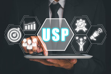 USP, Unique Selling Proposition concept, Businessman using digital tablet with Unique Selling...