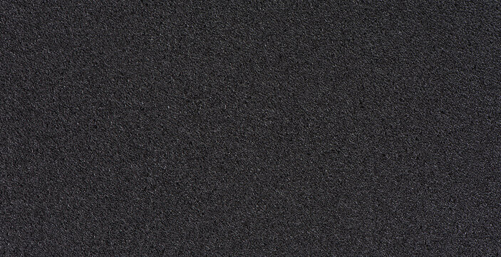 Black soft foam board background. black sponge surface texture. © zhikun sun