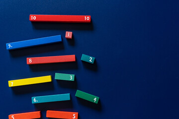 Сolorful math fractions on blue background. interesting math for kids. Education, back to school...