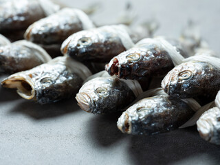 a string of 20 dried corvinas