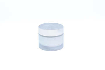 Small bottle with grey lid on white background