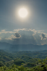 The sun shines on a clear day.