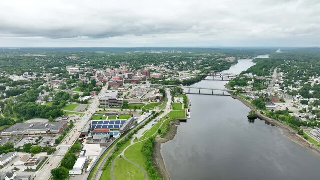 Drone shot of the Penobscot River flowing along Bangor, Maine.