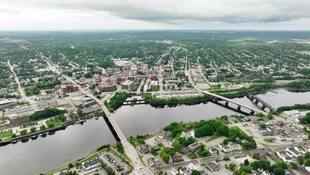 Drone shot of the Penobscot River flowing through Bangor, Main.