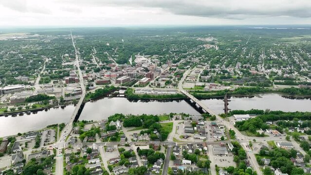 Wide aerial view of Bangor, Maine on a cloudy day.