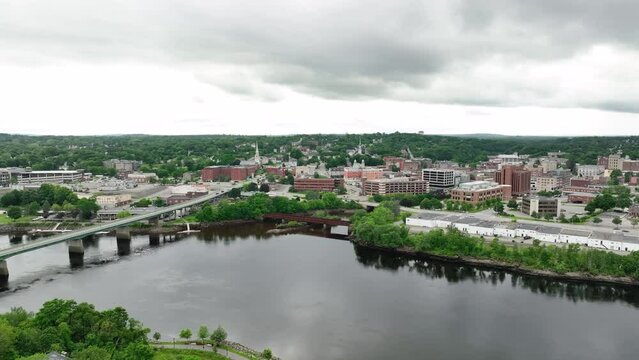 Drone shot pushing over the Penobscot River to reveal Bangor, Maine.