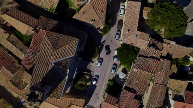 Top-down shot of a car turning into a street of luxury villas in St Cl&eacute;ment de la Riviere
