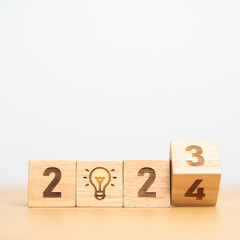 2024 block with lightbulb. Business Idea, Creative, Thinking, brainstorm, Goal, Resolution,...
